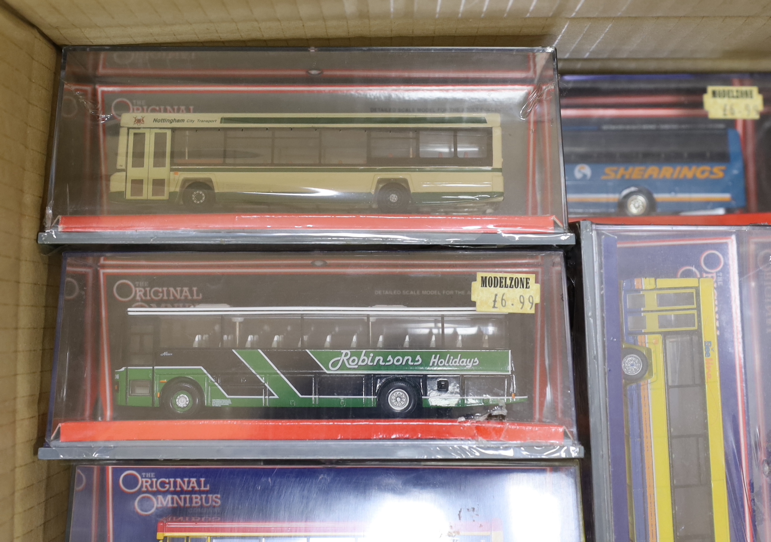 Eighteen boxed Corgi OOC coaches, including an AEC Reliance, a Dennis Dart, a Van Hool Alizee, a Leyland Lynx Mk.II, an Optare Delta, a Plaxton Premiere, etc.